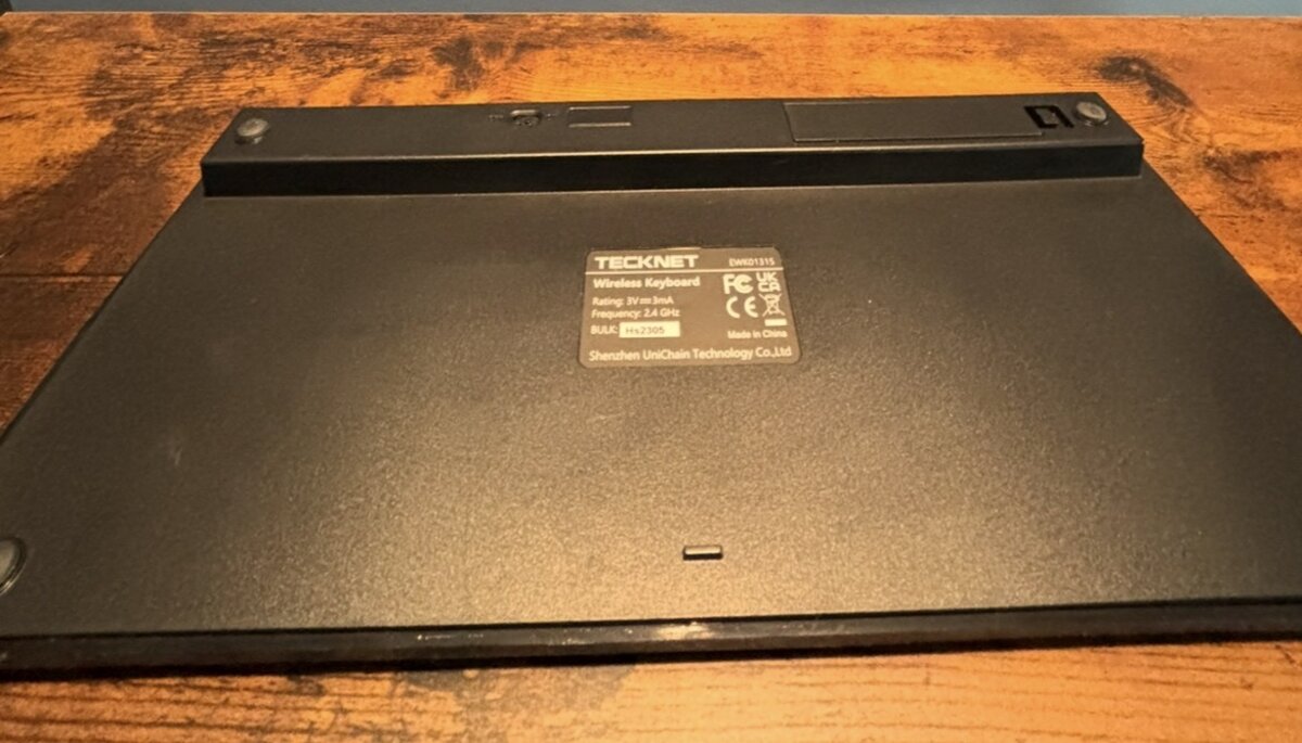TECKNET wireless keyboard back view showing specs